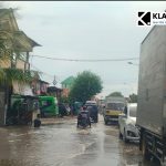 Jalan Raya Lintas Nasional di Desa Dharma Tanjung, Sampang Sering Tergenang Air, Pengguna Jalan Resah